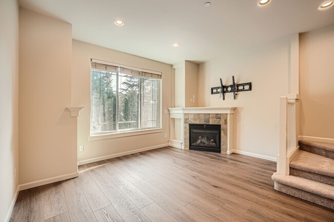Photo - Charming three-level Townhome available for immediate move in.