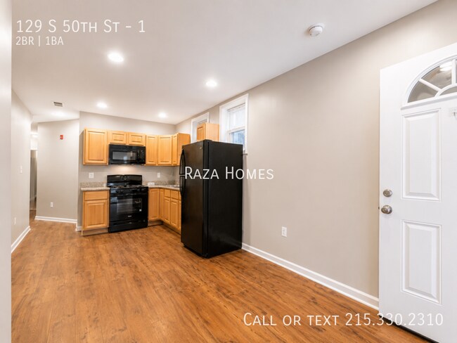 Building Photo - 129 S 50th St Unit 1