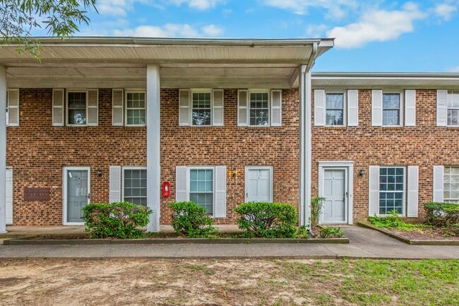 Building Photo - Updated Two-Bedroom Condo with New Kitchen Appliances and Private Patio