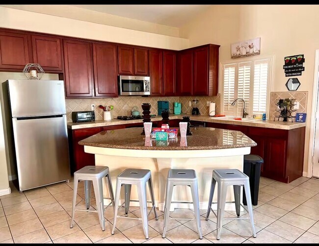 Photo - Super Great Deal on this fully furnished 4 BD 2 BA house with a Pool and Solar