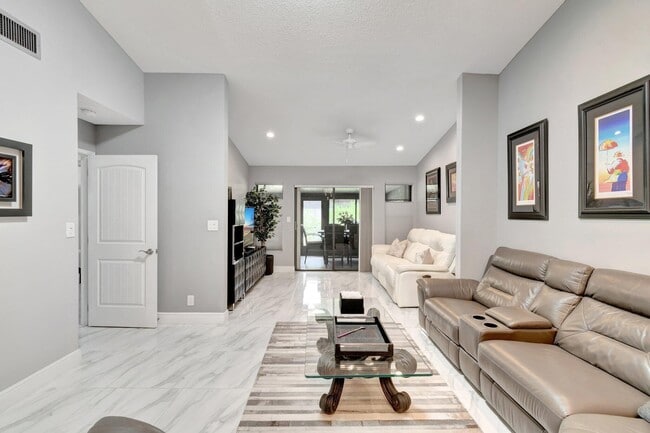 10927 Dolphin Palm Ct