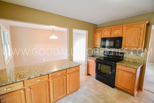 Photo - Charming 3-Bedroom Home in West Des Moines with a 2-Car garage and a fenced yard