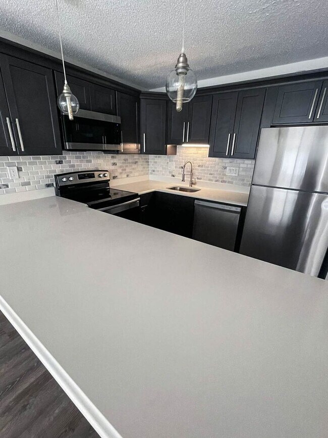 Photo - 1 Bed Condo w/ Laundry and Parking Unit 471 Whalley Ave  - A