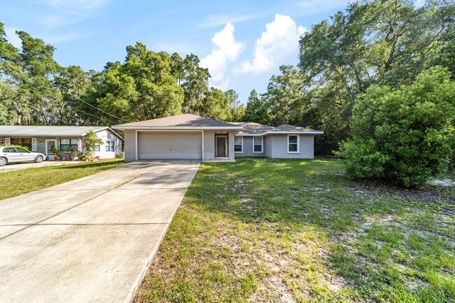 Photo - Peaceful 3-Bedroom Home with Open Floor Plan & Two-Car Garage in Rainbow Lakes Estates!