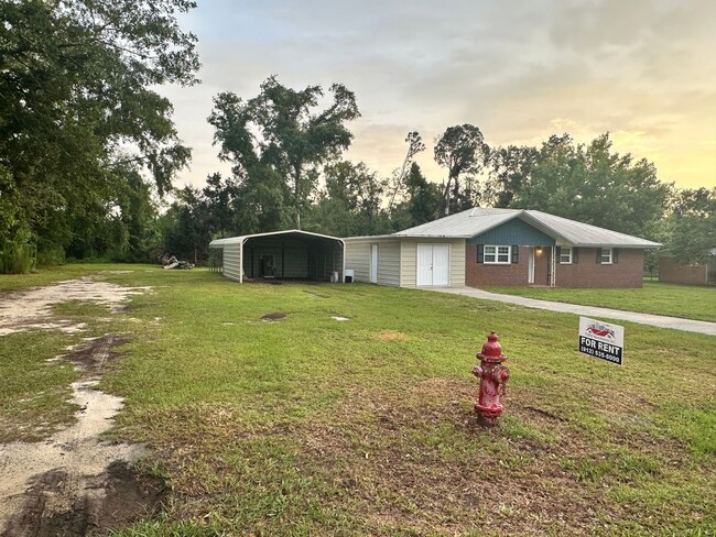Photo - 3 Bed 2 Bath Brick Home with Additional Living Space - Newly Renovated