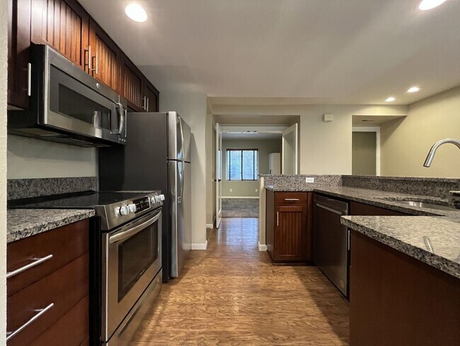 Photo - Ground Floor End Unit on Jantzen Beach with River Views & Flexible Living Space