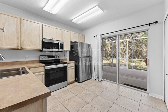 Building Photo - 5873 Fishhawk Ridge Dr