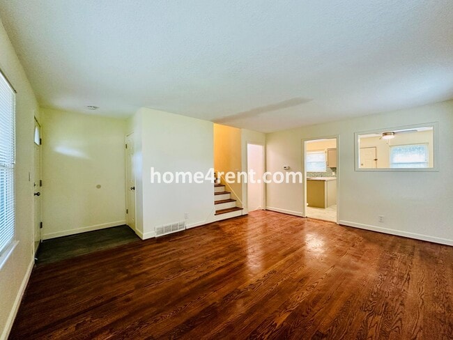 Photo - Olathe Duplex w/ Wood Floors, Finished Basement, and a Fenced Yard!