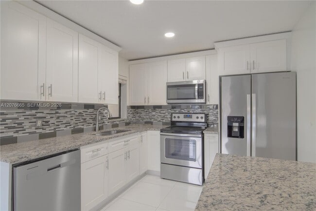 Photo - 3745 Cocoplum Cir Unit 3561