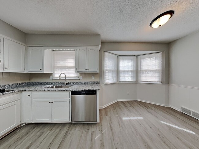 Photo - Spacious 4BR Home with Finished Basement, Fireplace & Unique Layout