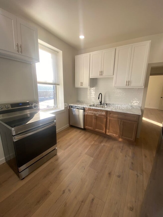 Building Photo - 4716 Louisiana Ave Unit 2F