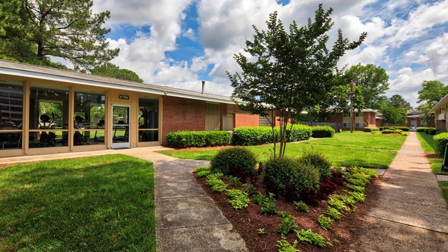 Building exterior and manicured lawns