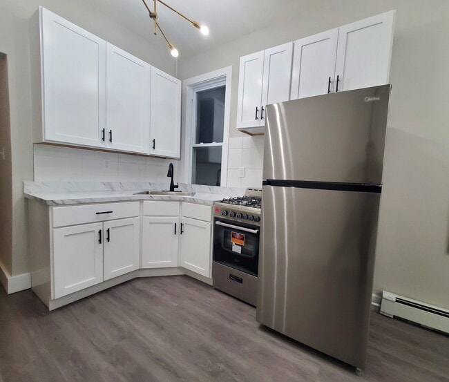 Building Photo - 61 Greenville Ave Unit 2R