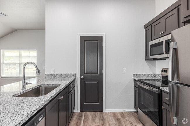 A - 4BR, 2BA - 1240SF - Kitchen - Enclave Estates at Chickasha