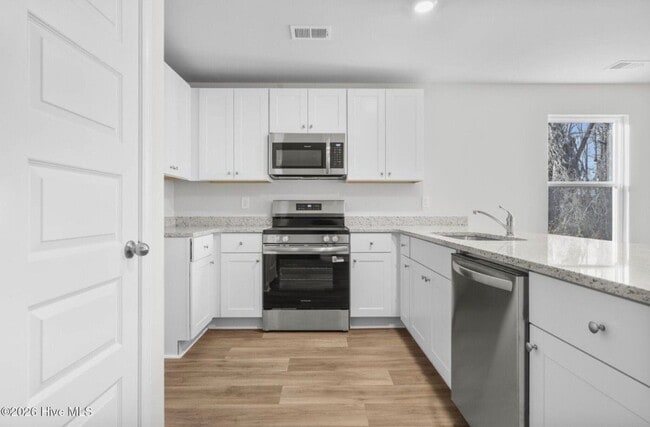 Photo - 6393 Swainson St SW