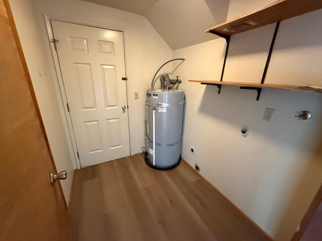 Laundry room, entrance to side outdoor, entrance to half bath - 329 Bessie St