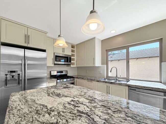 Photo - Beautiful 4B 2BA Home w/ AC, W/D, & Solar Panels!