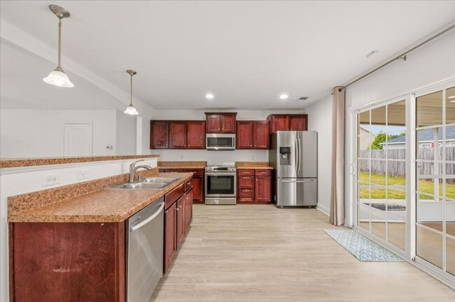Photo - Spacious 5-Bedroom Home with Screened Patio & Private Fenced Yard in Guyton