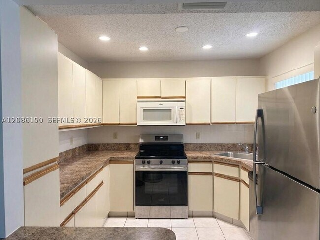 Photo - 3679 Cocoplum Cir Unit 3528