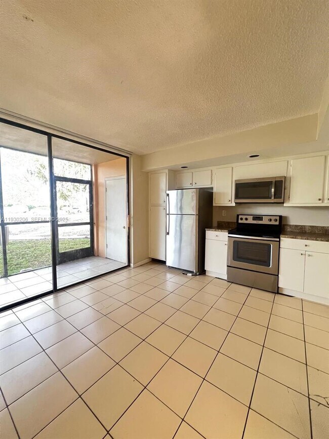 Building Photo - 8600 SW 133rd Avenue Rd Unit 107