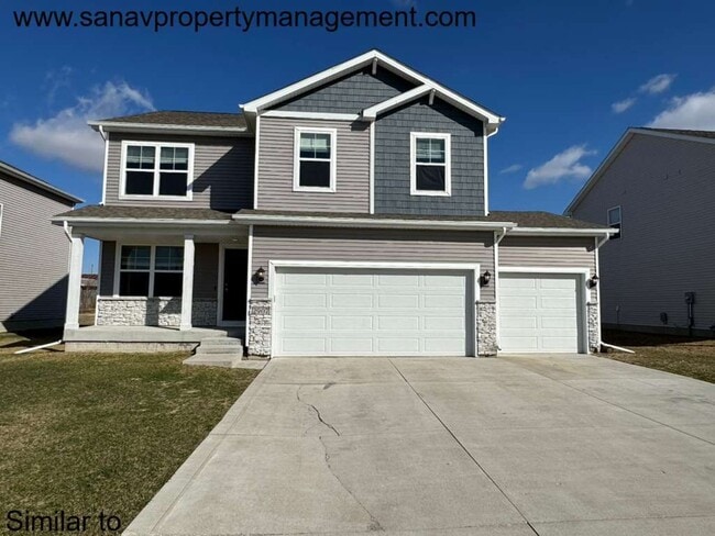 Building Photo - "Ankeny Oasis: Luxurious 4-Bedroom Home with Expansive 3-Car Garage and Secluded Backyard Retreat!"