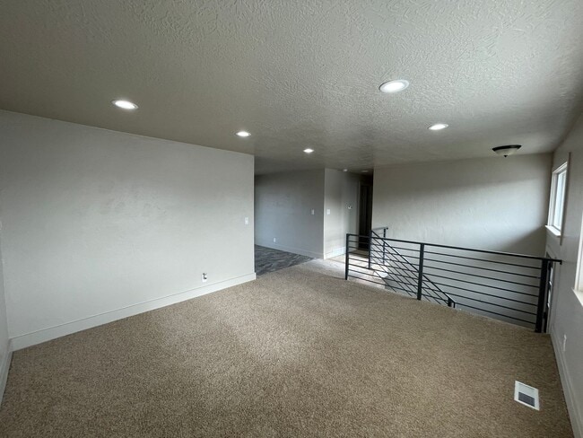 Photo - Spacious 6-Bedroom Magna Home with Fenced Yard