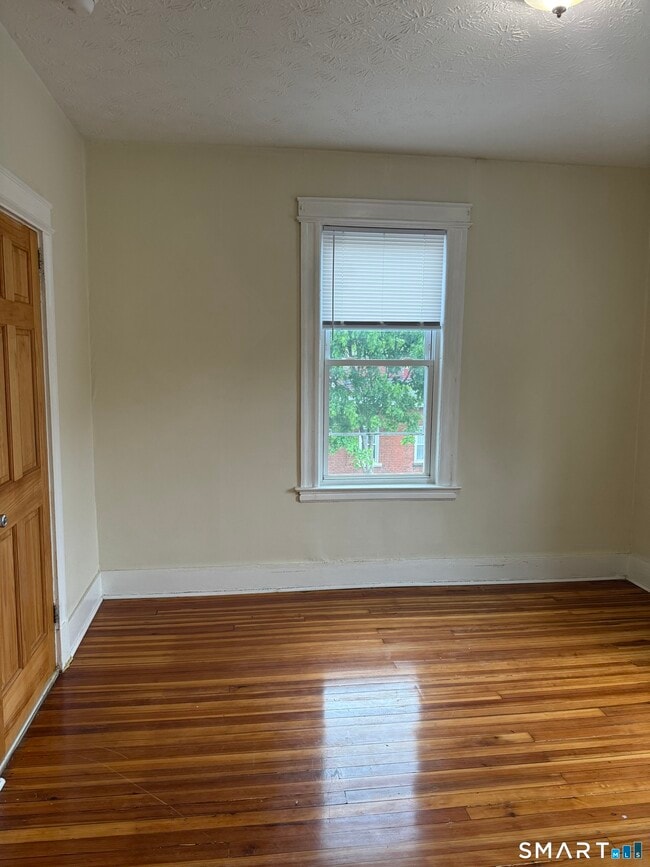 Photo - 48-50-50 Bliss St Unit 3rd Flr. East