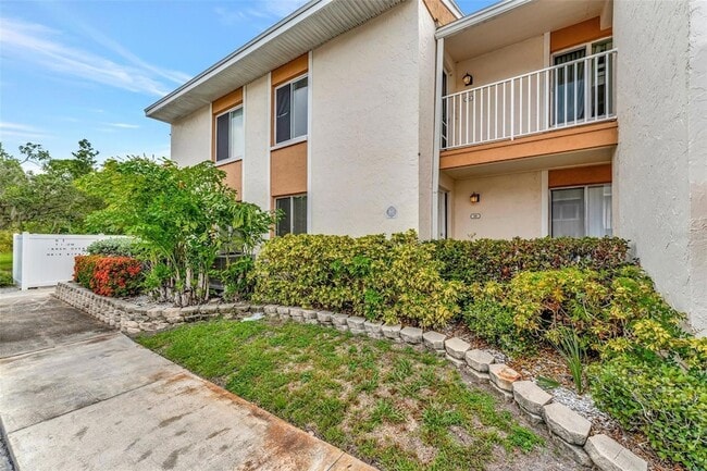 Building Photo - 9940 7th Way N Unit 101
