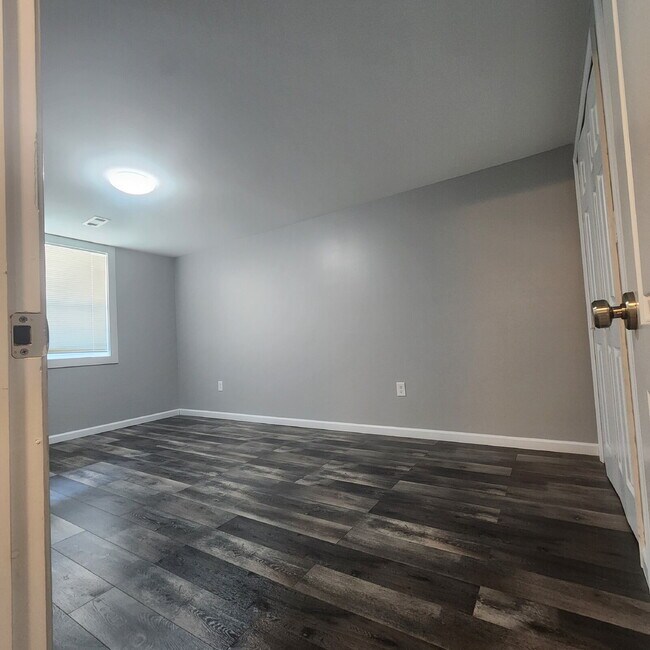 Photo - "Charming 2-Bed Basement Apartment with Hardwood Floors in Clinton, MD!" Unit Basement