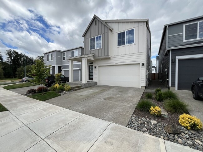 Photo - Stunning 2024 Built 5BR Home with Main-Level Suite, EV Charger & Covered Patio Near River Terrace