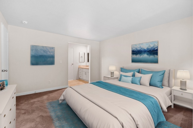 Experience comfort and style in this beautifully designed bedroom, complete with an en-suite bathroom.