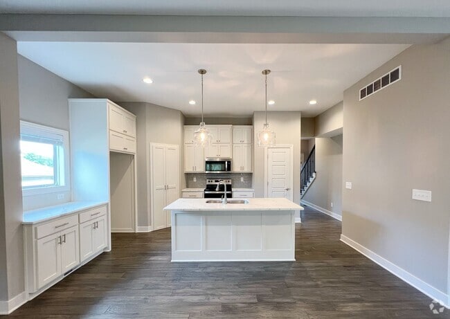 Building Photo - SEE IT NOW: Modern 3-Bedroom Townhome with...