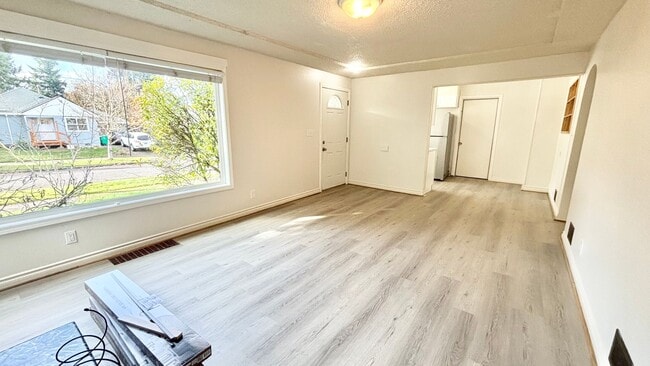 Photo - Recently Renovated House With Fenced Back Yard, Attached Garage, and Basement