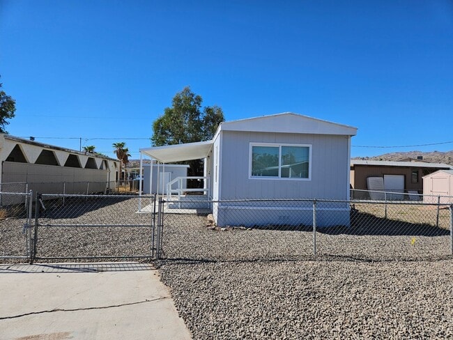 Building Photo - First Month Free!! Remodeled and Cute Manufactured Home in Central BHC