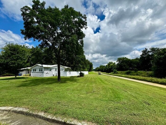 Fenced yard by Greenway near Grissom High School