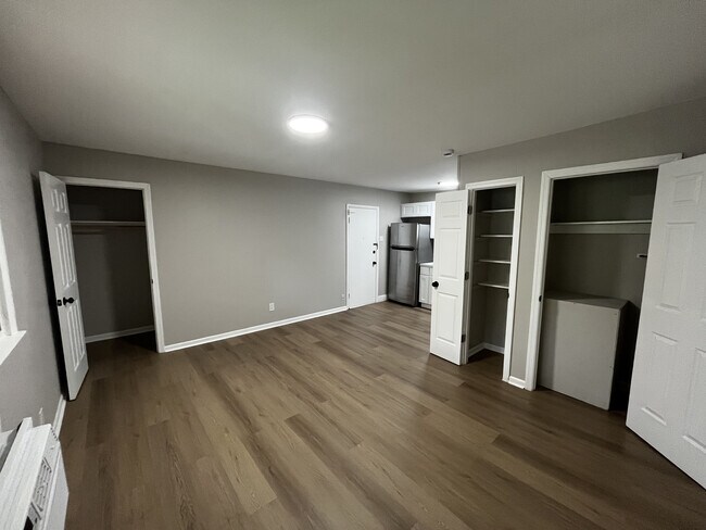 Living Space W/ ample storage - Cornell Manor Apartments