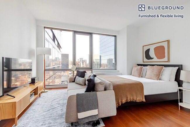 Photo - 435 W 31st St Apartment Unit FL33-ID1783