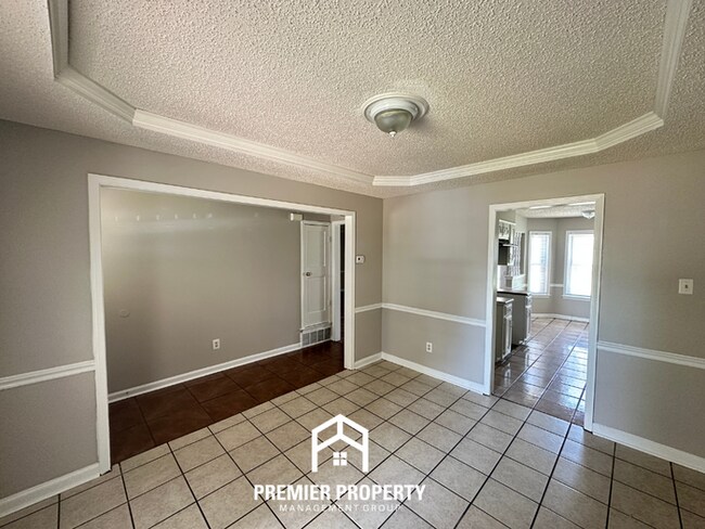 Photo - Beautiful 4BR/2BA Near Southwind | 1,853 Sq Ft, Dual Dining Areas, Fireplace & Garage