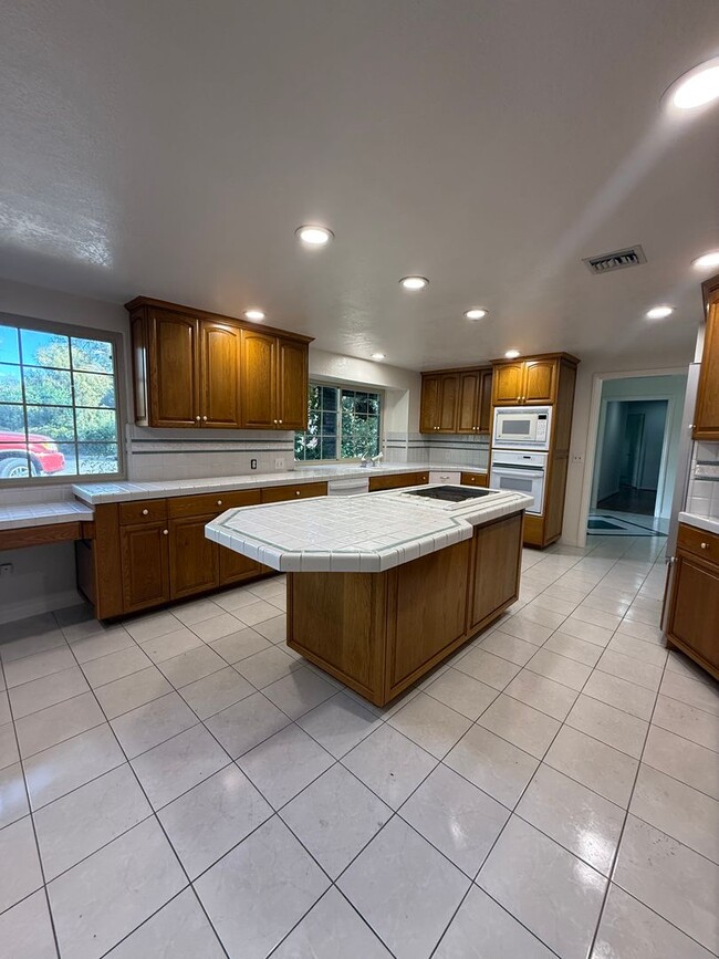 Photo - Ranch Style Home on Large Lot with Circular Driveway