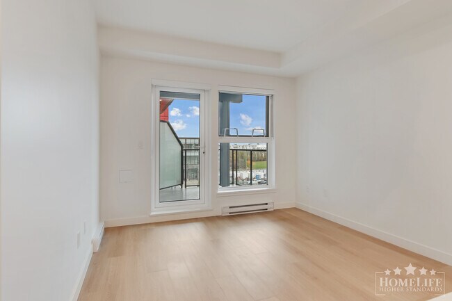 Photo - Contemporary 1-Bedroom Plus Den at The Dis... Unit 514