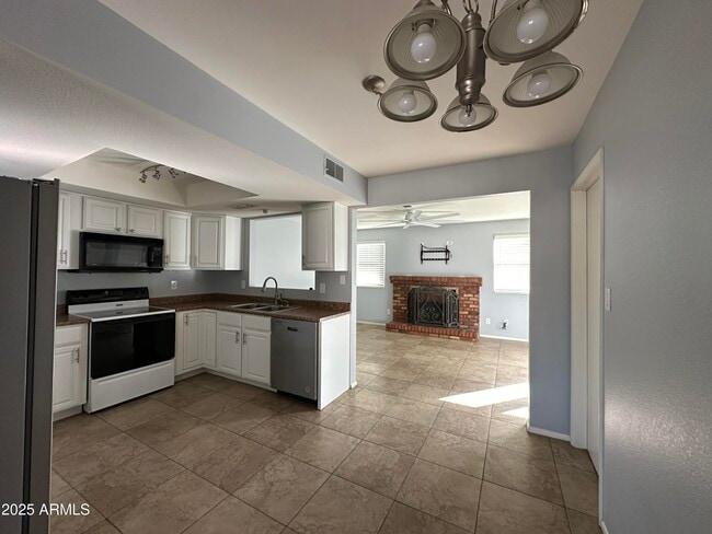 Photo - 10421 W Puget Ave