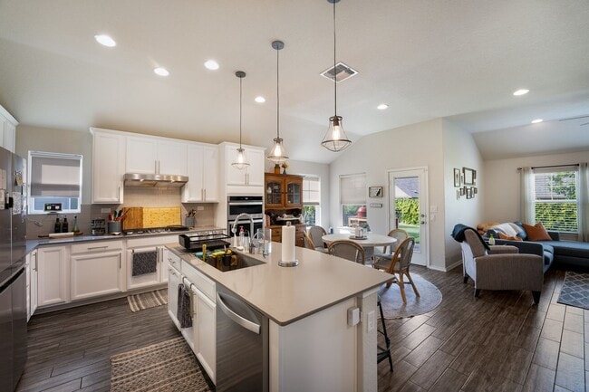 Photo - 4 Bedroom Home with Stone Patio, Built-In Gazebo & Amenity-Rich Community Living