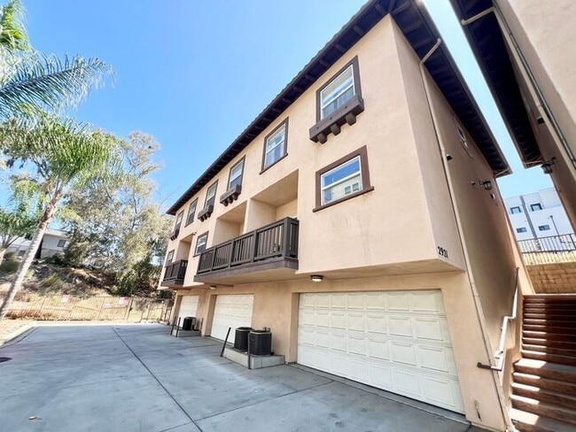 Building Photo - Spacious 3BR Townhome with Solar, Home Gym & 2-Car Garage