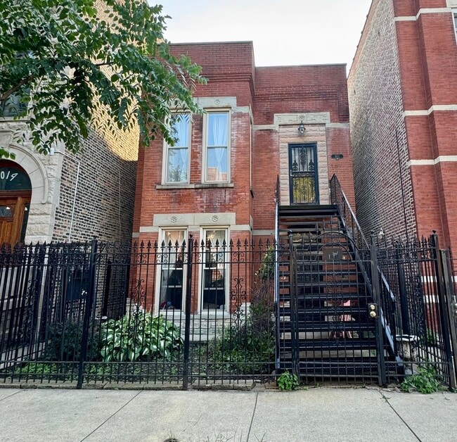 Building Photo - 1012 S Oakley Blvd Unit 2