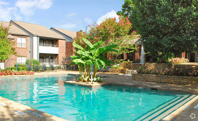 Take a dip in the pool. - The Hudson Apartments