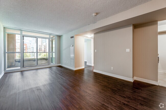 2BR + Den, 1BA - 780SF - Living Room - WestQ