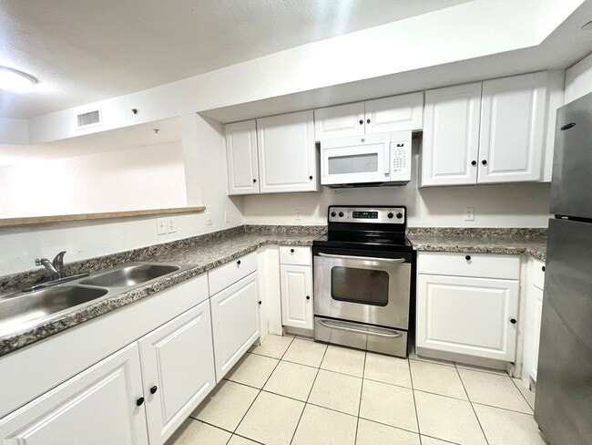 Photo - Welcome to Your Ideal Home in North Miami'...