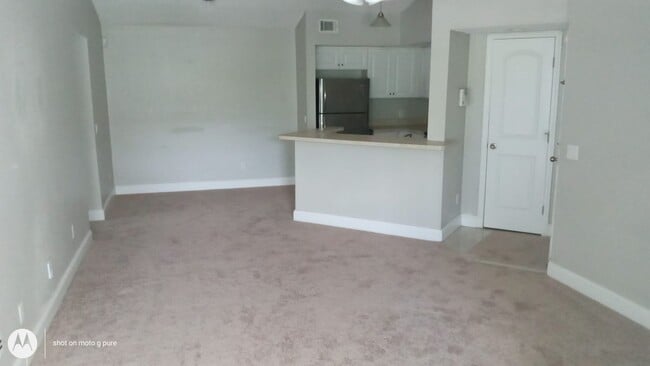 Photo - Spacious third floor unit located in the gated community of Venetian place