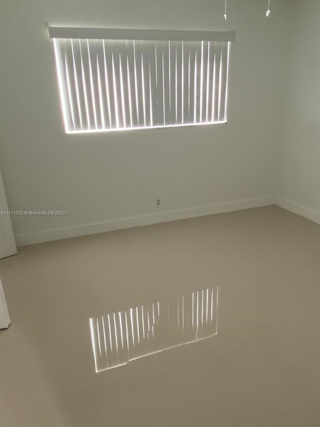 Building Photo - 7760 NW 50th St Unit 103 Rental