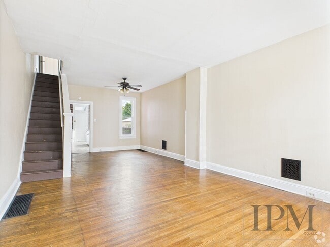 Building Photo - Available Now! Spacious 5 Bedroom Home Loc...